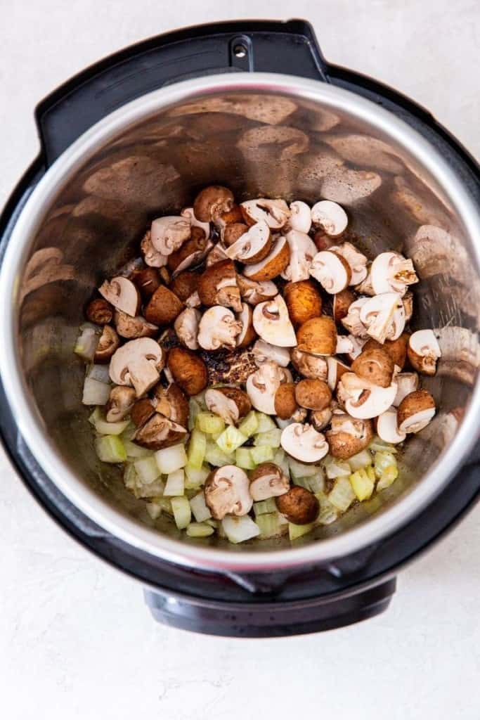 add onions and mushrooms in instant pot