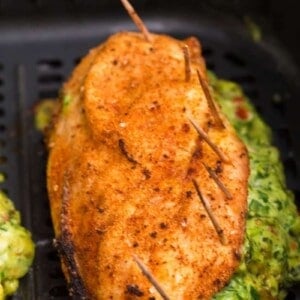 close up of stuffed chicken breast in air fryer