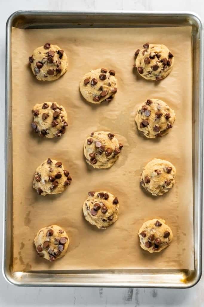 place dough scoops 2 inches apart on baking sheet