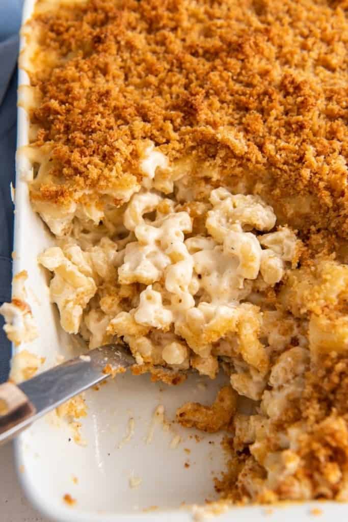 spoon dishing up some mac and cheese with cream cheese