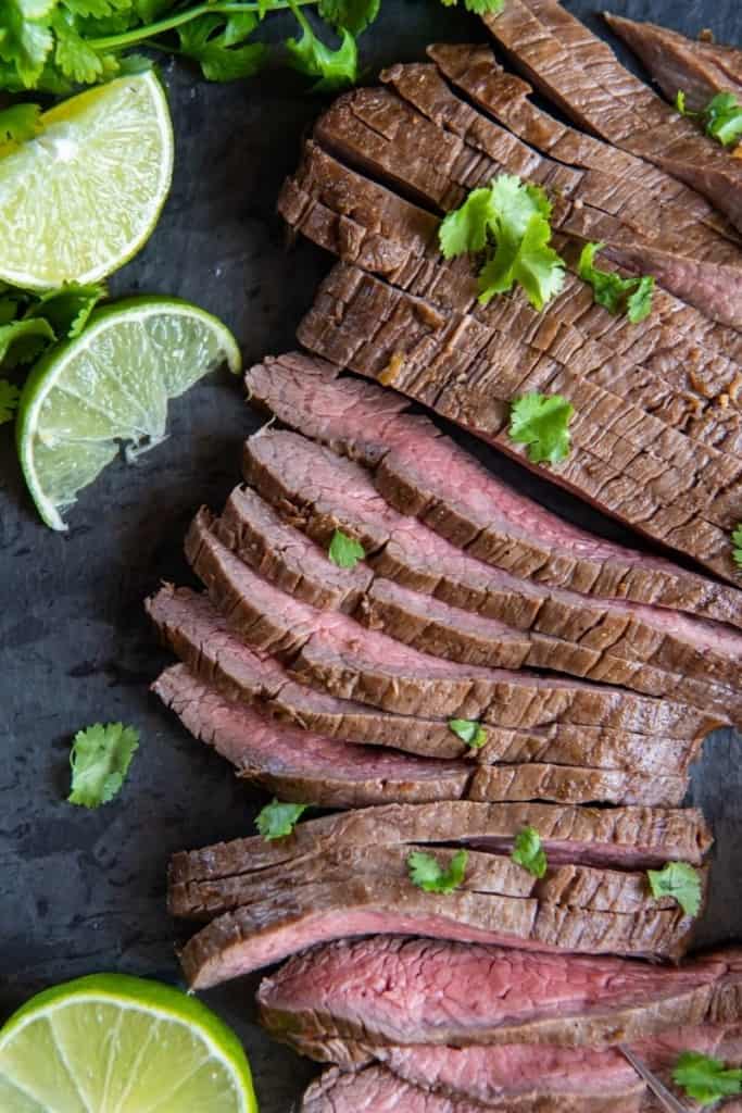 air fryer skirt steak slices with lime wedges