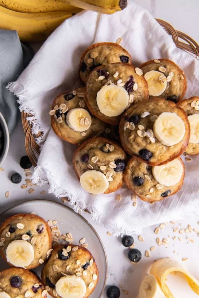 bowl with banana blueberry oatmeal muffins