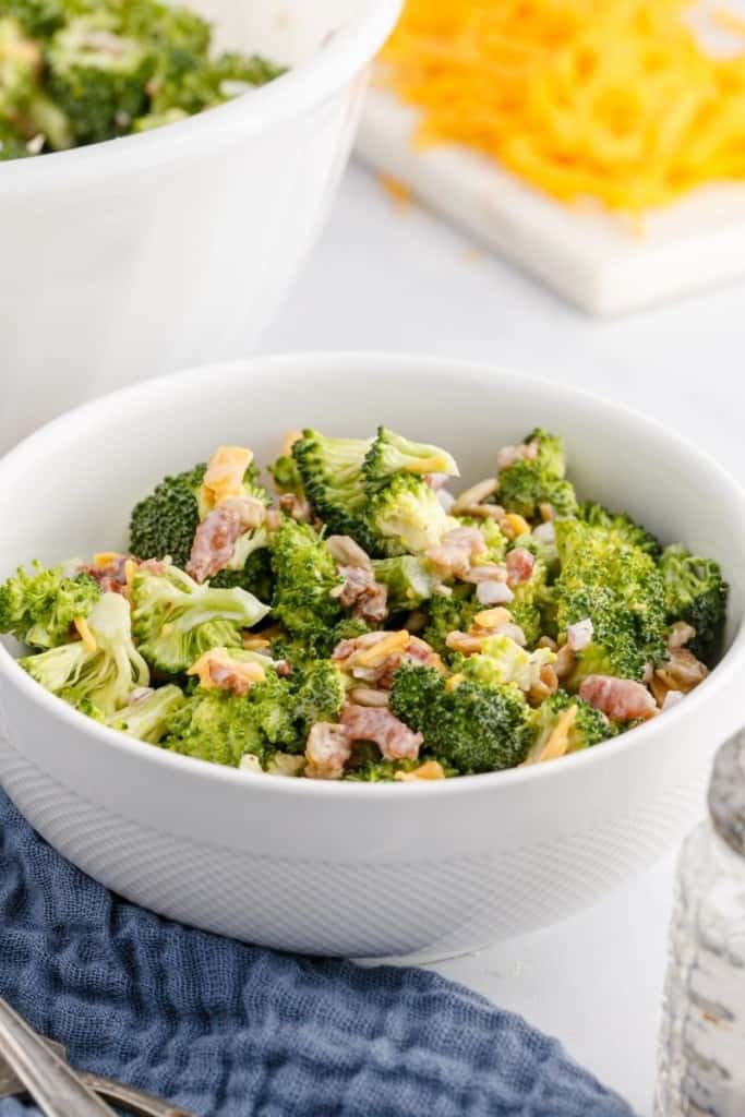 white bowl with broccoli salad