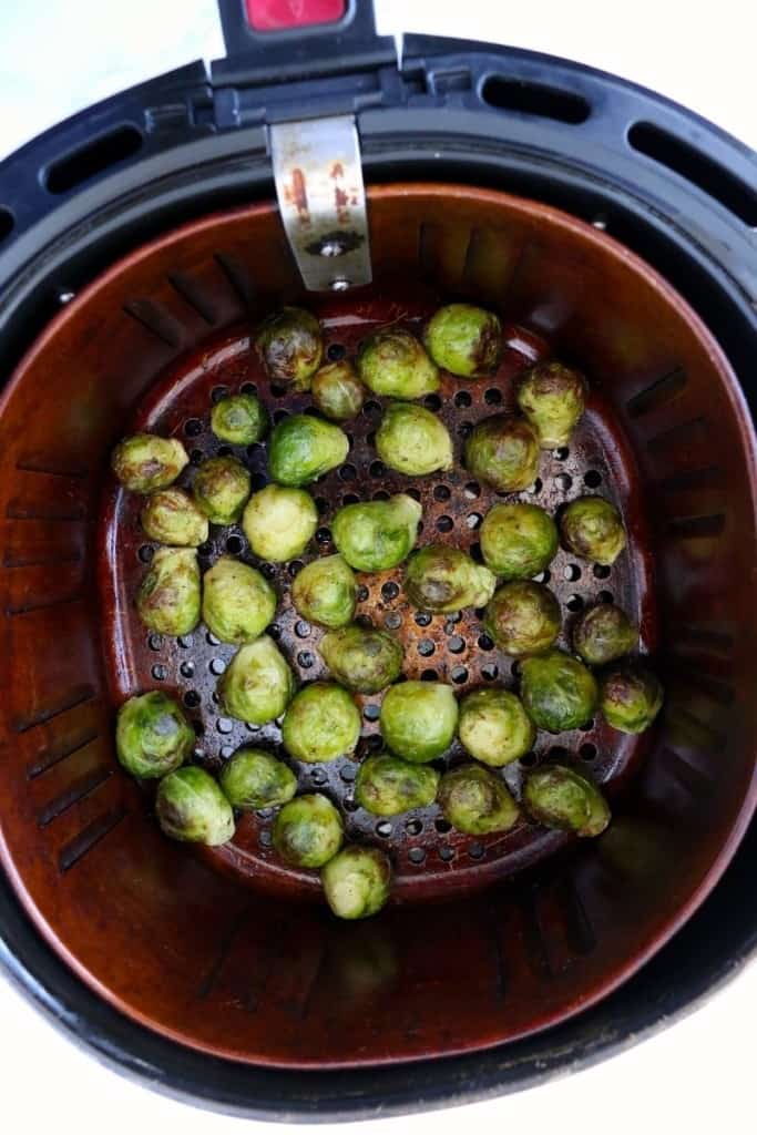 Cooked brussel sprouts in air fryer basket