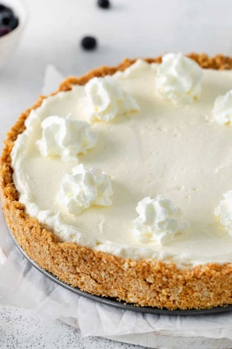 5 ingredient no-bake cheesecake with whipped cream dollops