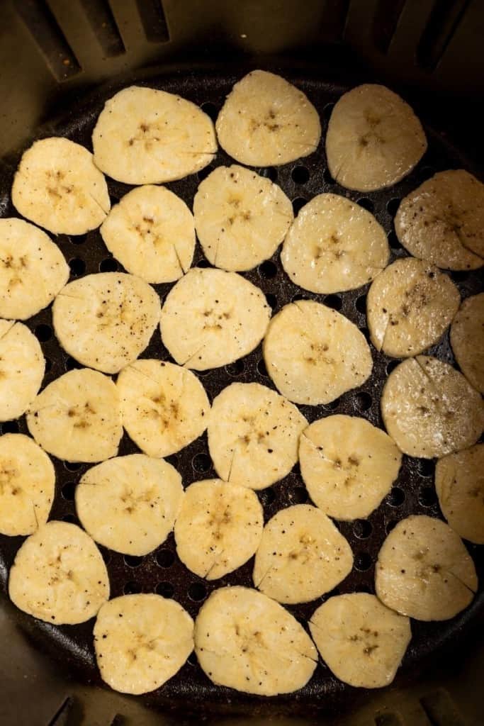 slice plantains as thinly as possible with mandolin slicer