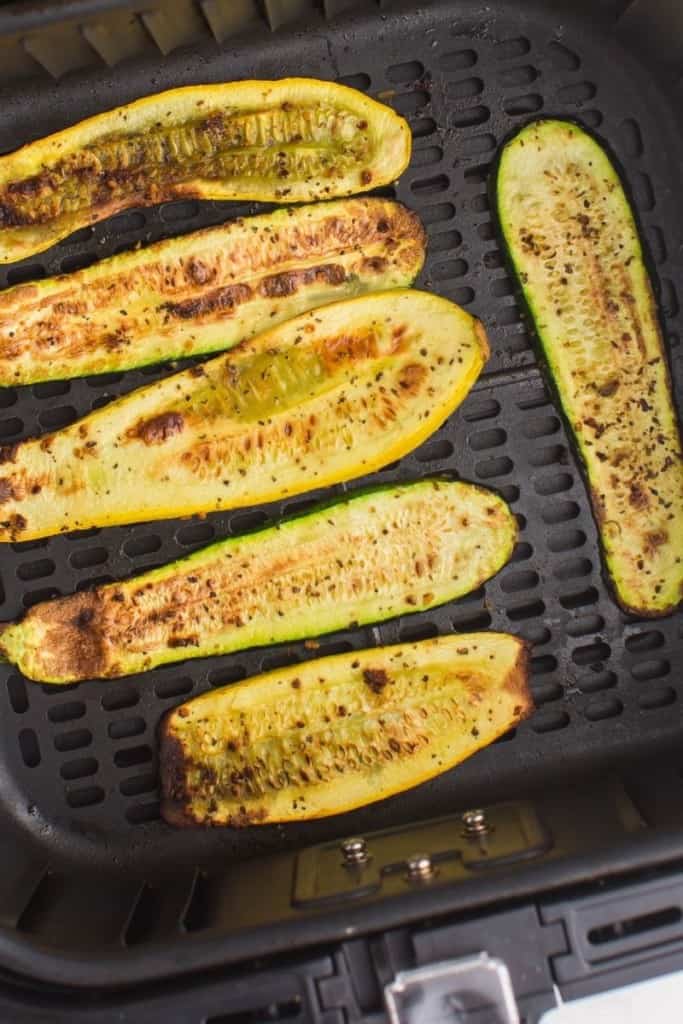 slices of squash placed in air fryer