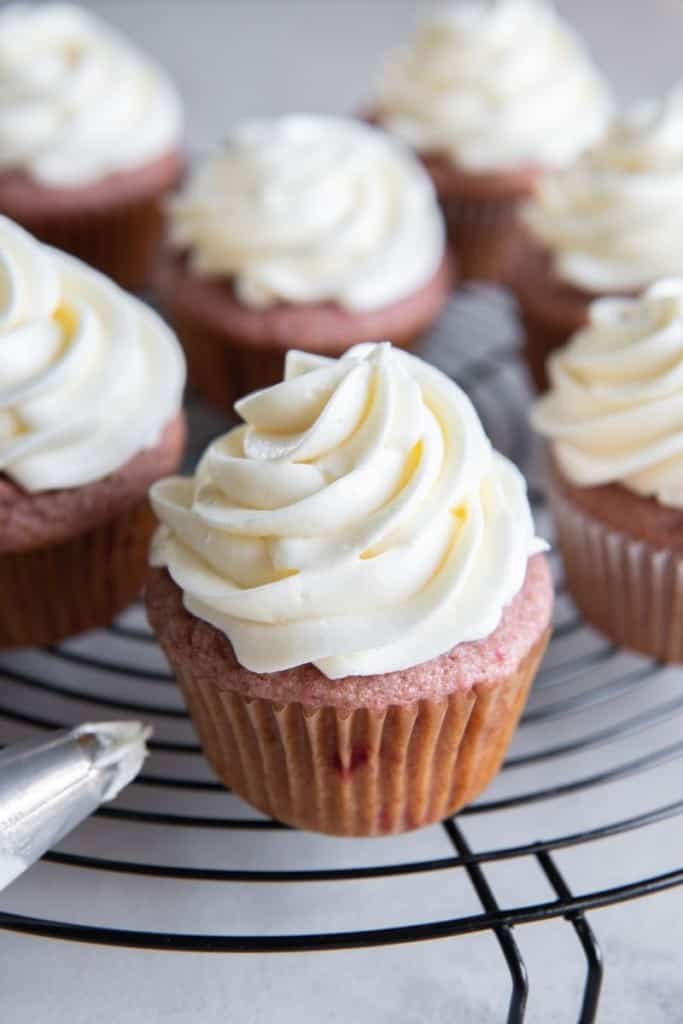 cream cheese frosting without butter on platter of cupcakes