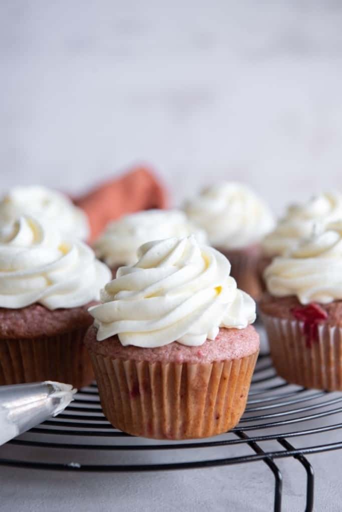 cupcakes topped with cream cheese frosting without butter