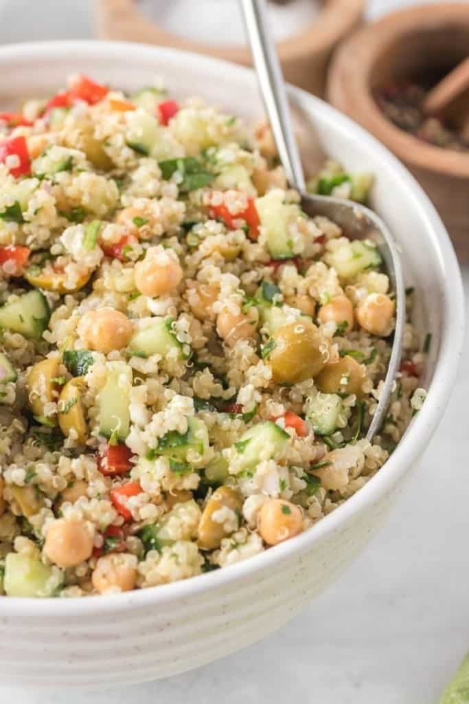 close up of quinoa chickpea salad in salad bowl