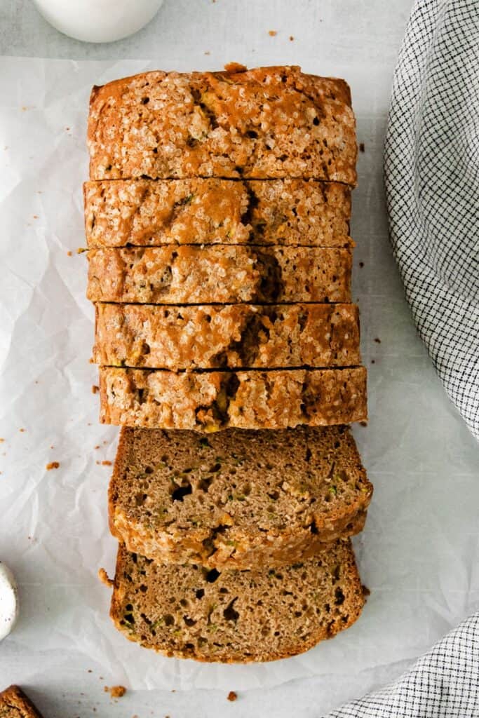 Close up of the zucchini bread sliced on a counter.