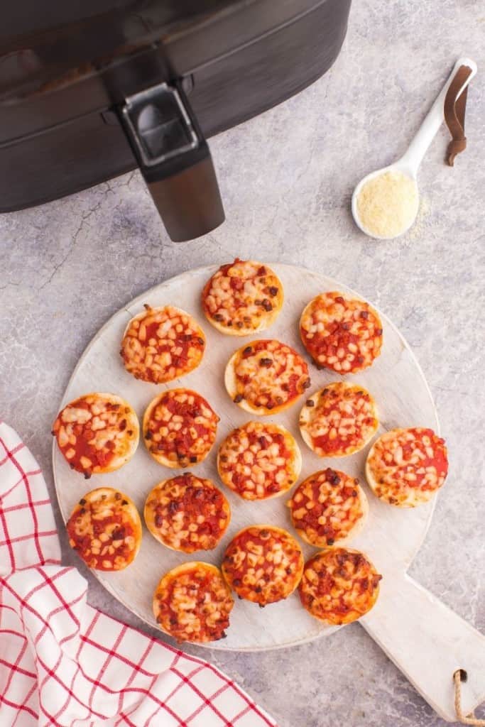 large white plate full of air fryer bagel bites