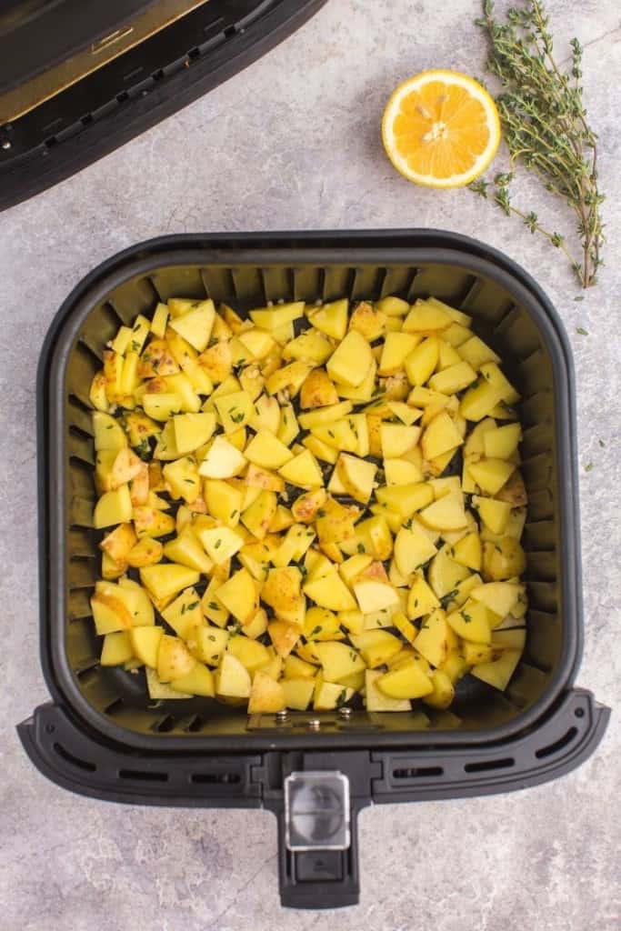 place diced potatoes in single layer in air fryer