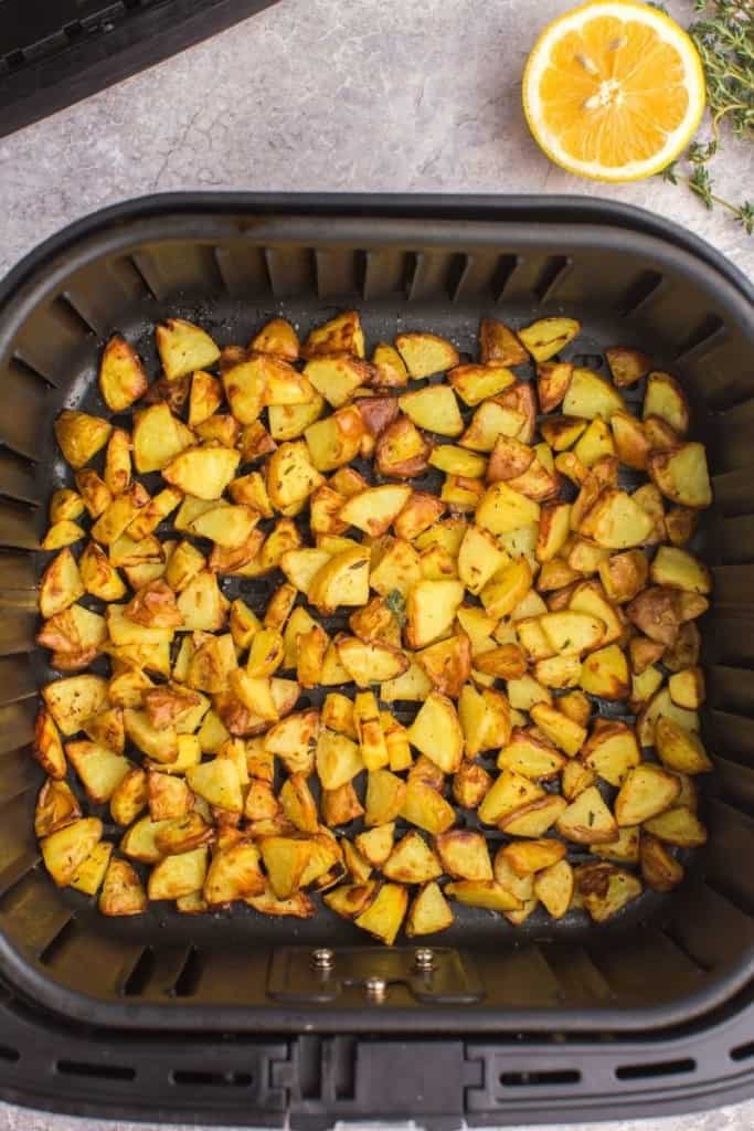 shake air fryer basket to mix up the diced potatoes