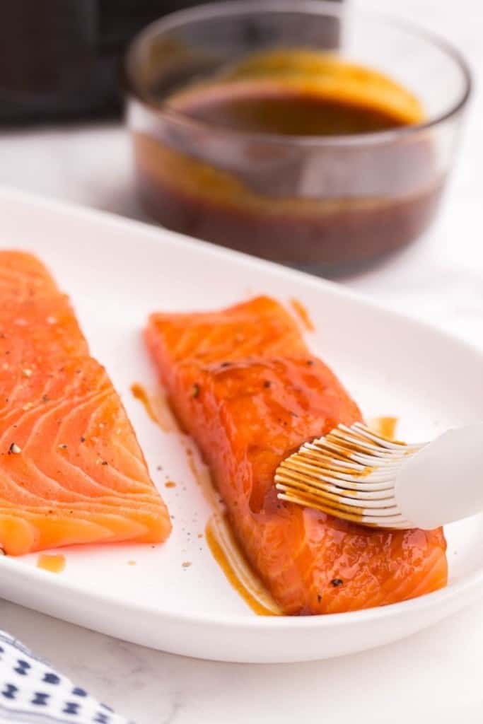 brush teriyaki sauce over salmon filets