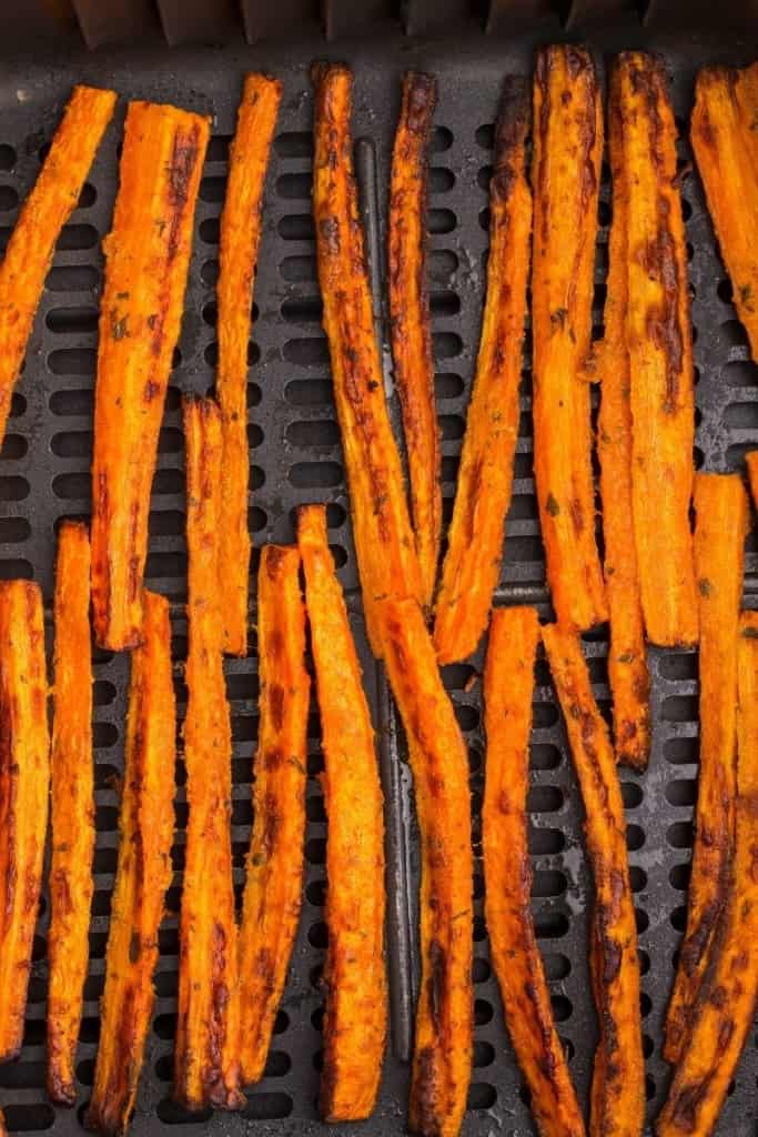 carrot fries cooking in air fryer