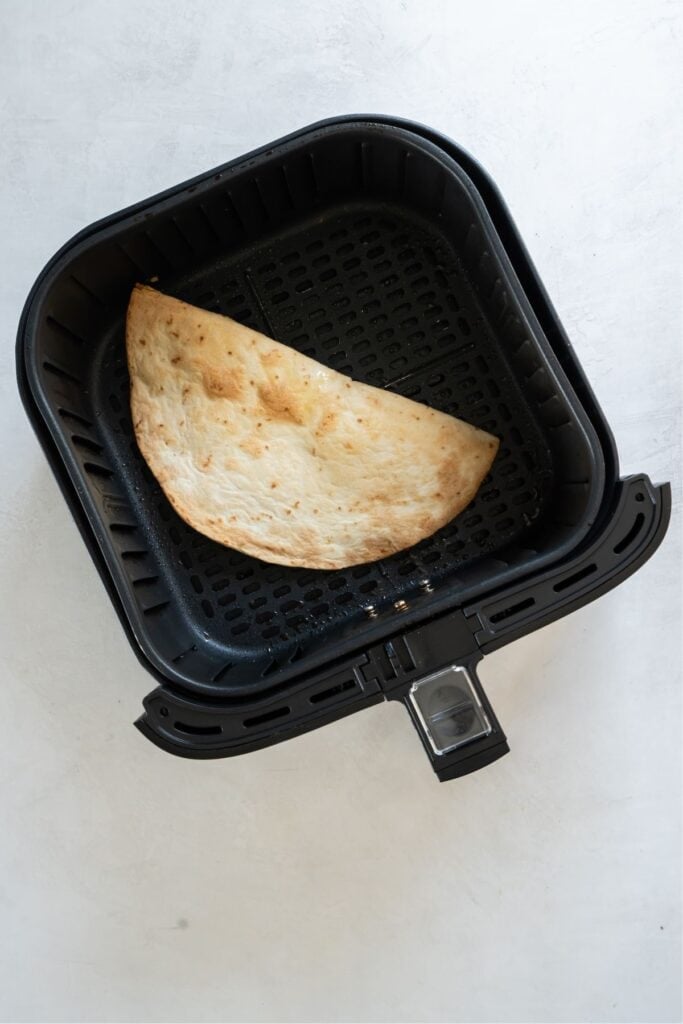 Cooked quesadilla in the air fryer.