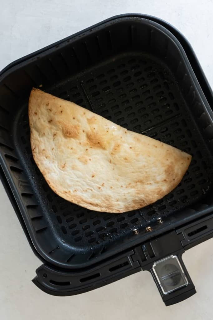 flip quesadillas over in air fryer to cook evenly