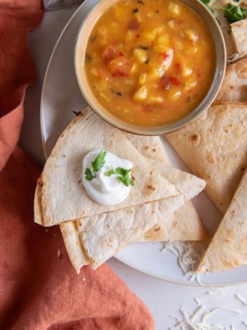 slices of quesadillas cooked in air fryer served with soup