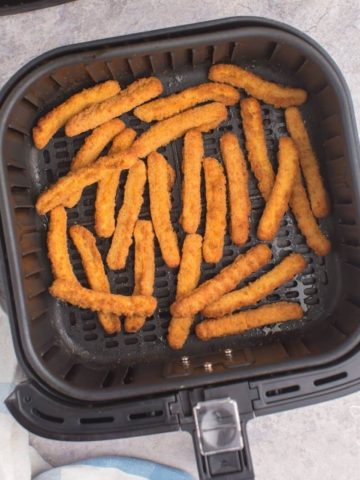 cook chicken fries thoroughly by shaking basket