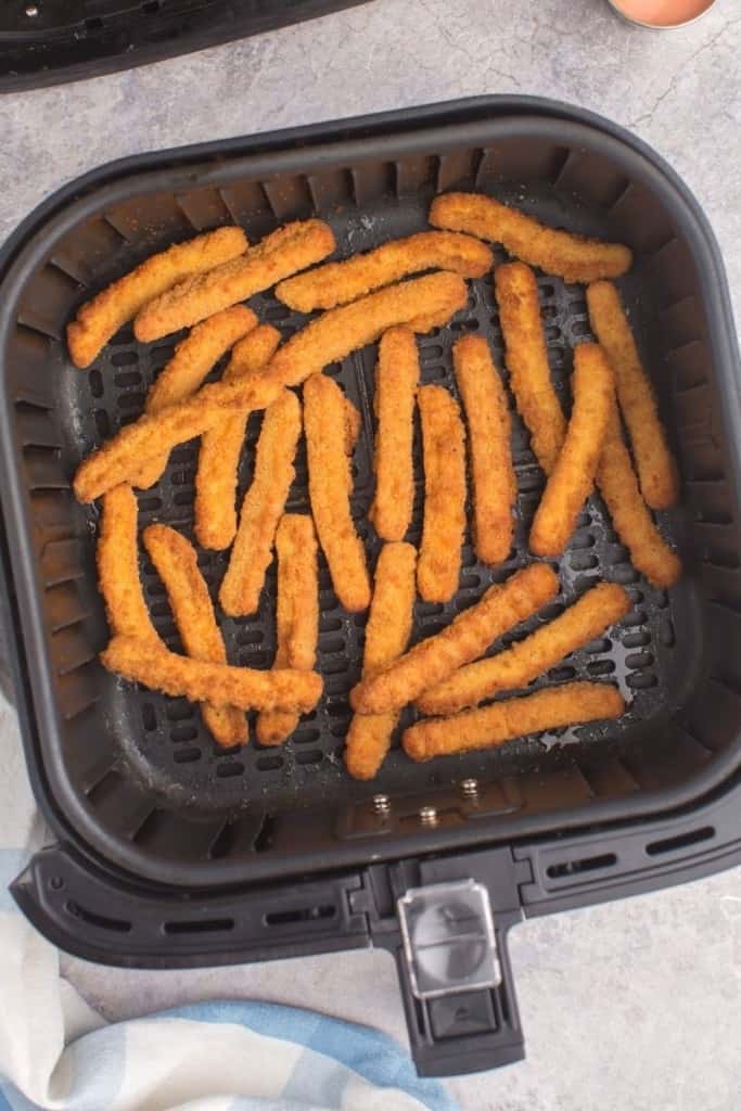 cook chicken fries thoroughly by shaking basket 