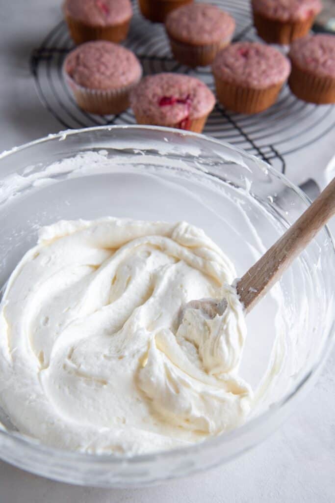 Cream cheese frosting with no butter in a mixing bowl.