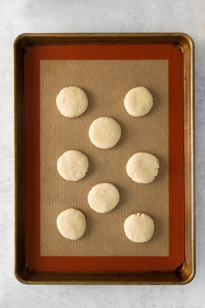 scoop out dough balls and place on baking sheet