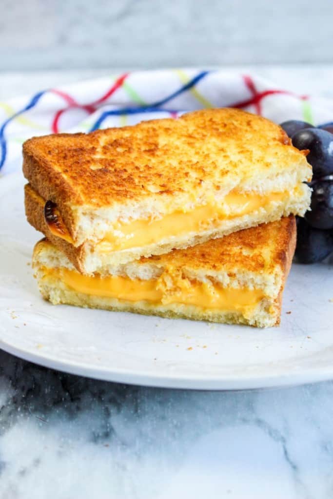 2 grilled cheese sandwiches stacked