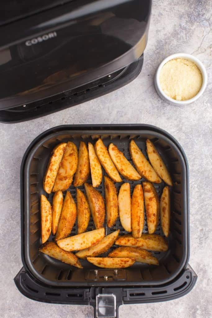 seasoned potatoes in air fryer basket