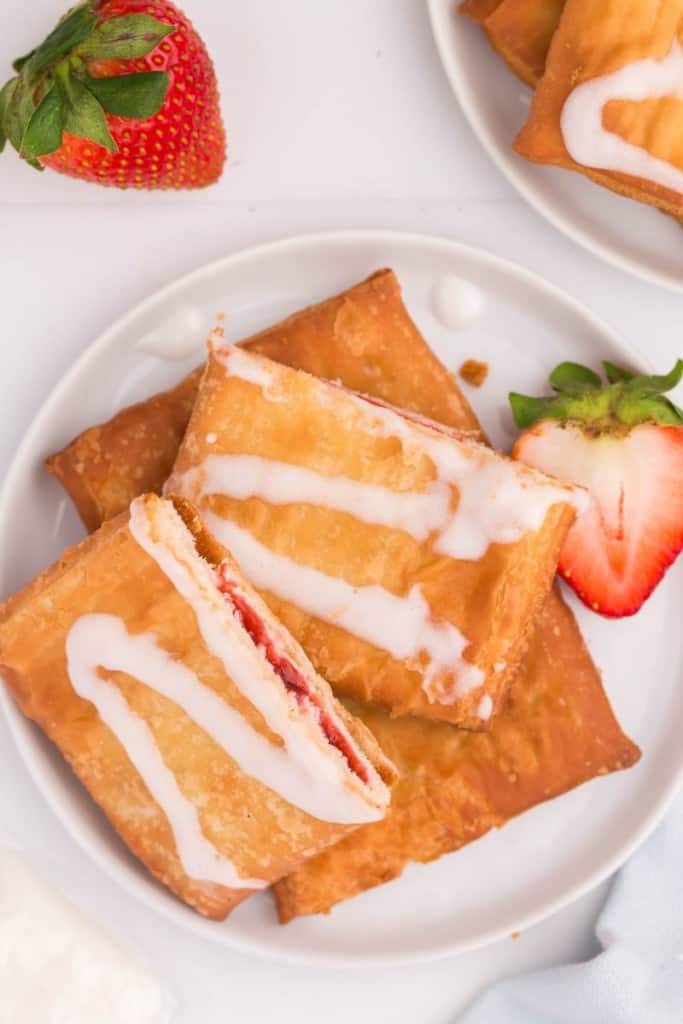 Close up of strawberry toaster strudel cut in half and iced