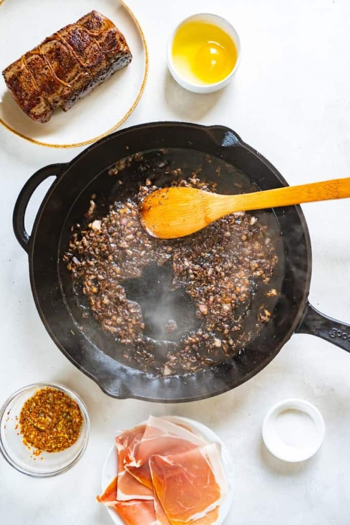 cooking onions in a skillet