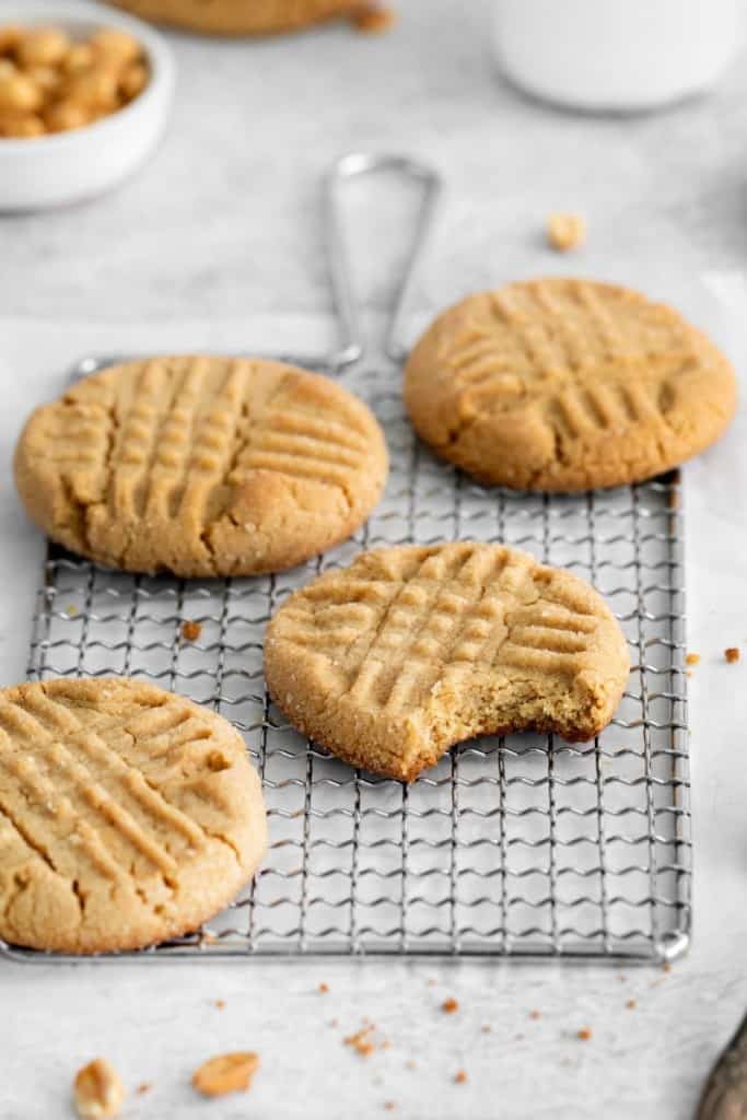 chewy peanut butter cookies on a wire rack