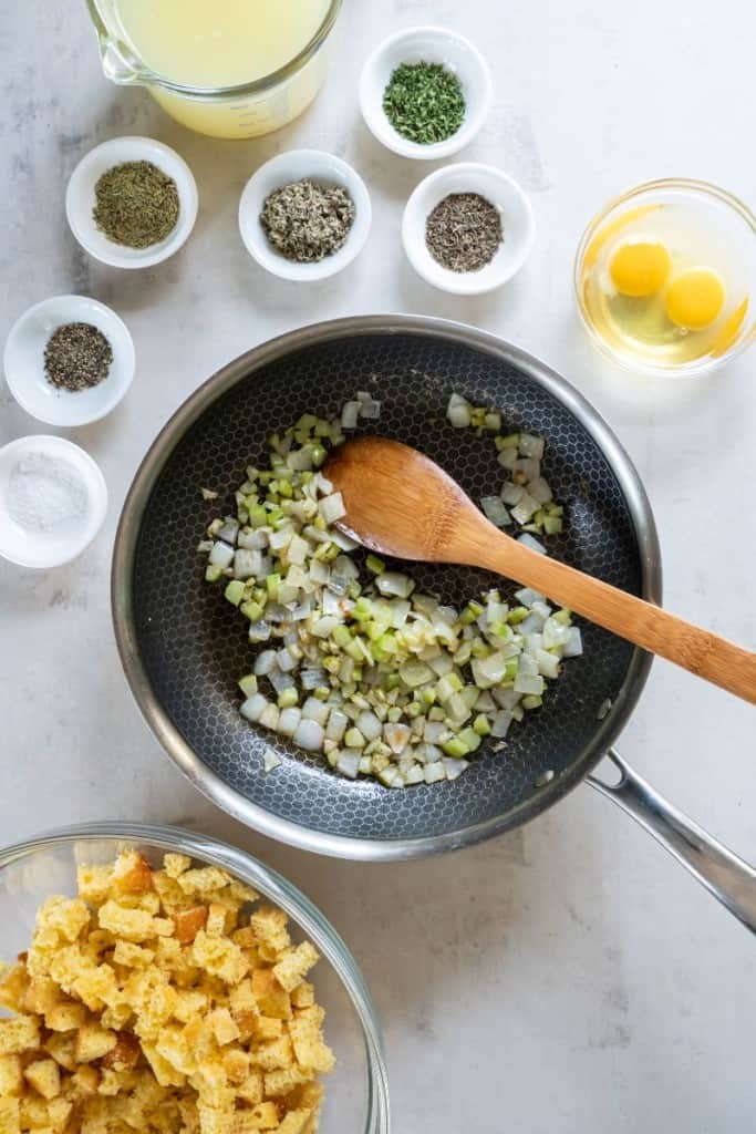 pan cooking some ingredients for cornbread stuffing