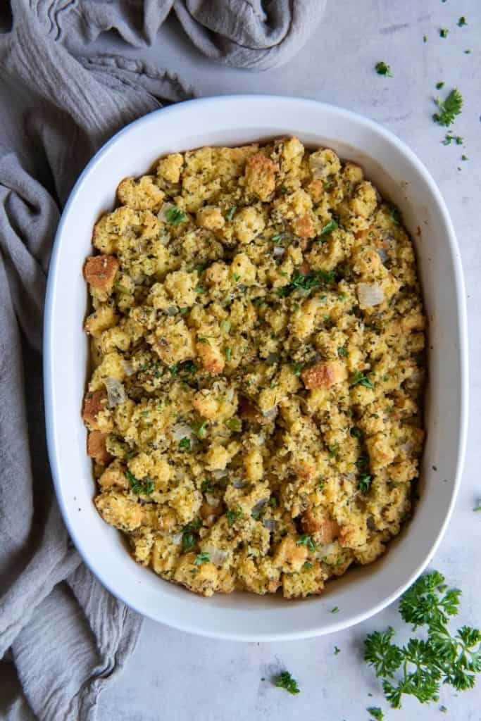 Cornbread stuffing in a white dish