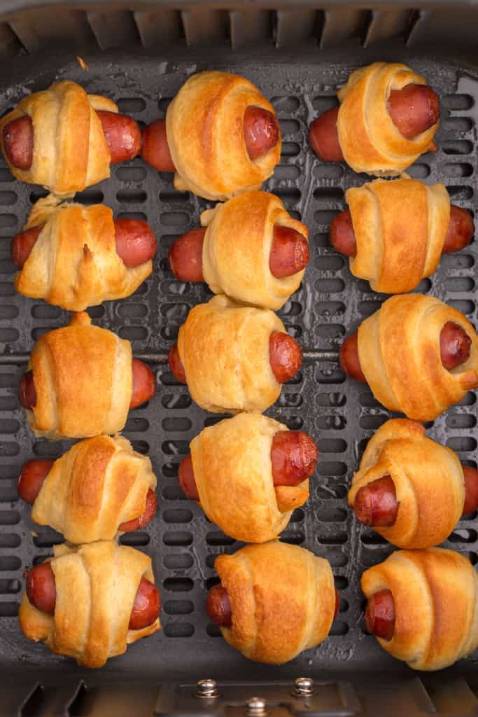 pigs in a blanket in an air fryer basket