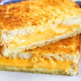 air fryer grilled cheese on a white plate