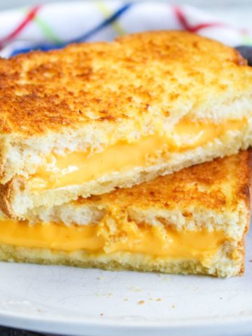 air fryer grilled cheese on a white plate