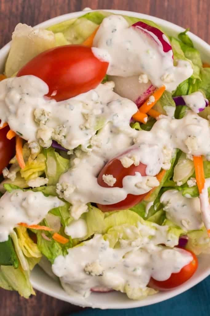closeup of a bowl with salad and the best blue cheese dressing