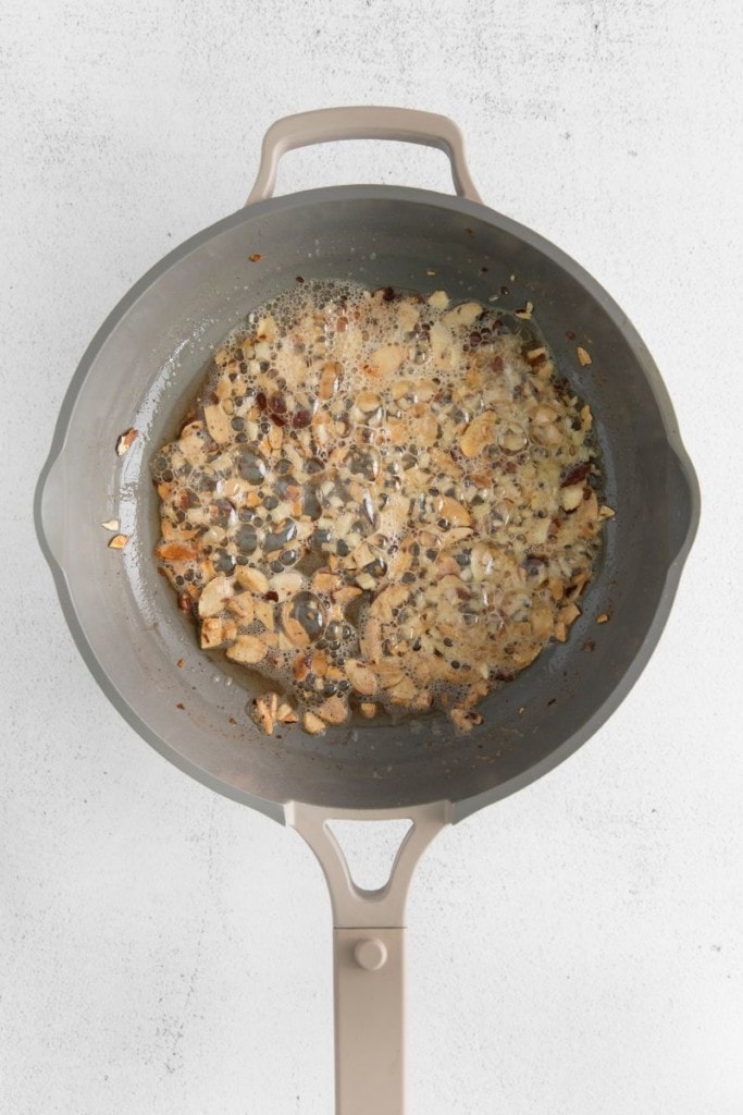 cooking almonds in a skillet