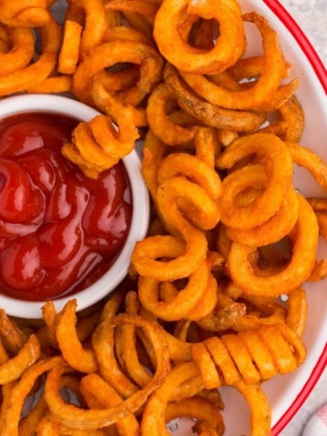 plate with arby's curly fries