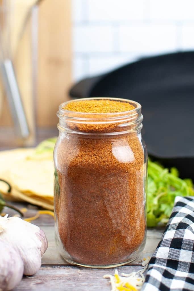 jar filled with homemade taco seasoning