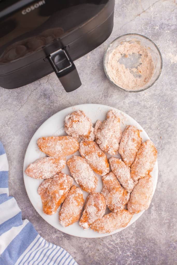 breaded chicken wings on a plate