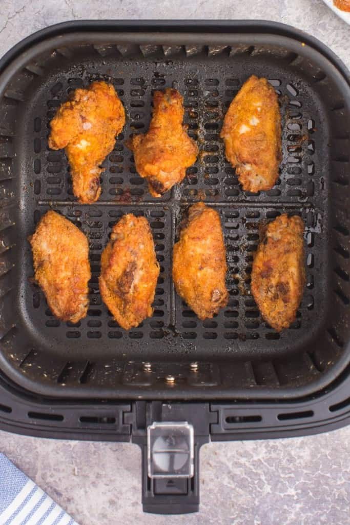 air fried chicken wings in an air fryer basket
