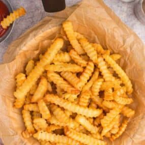 basket of air fryer crinkle cut french fries