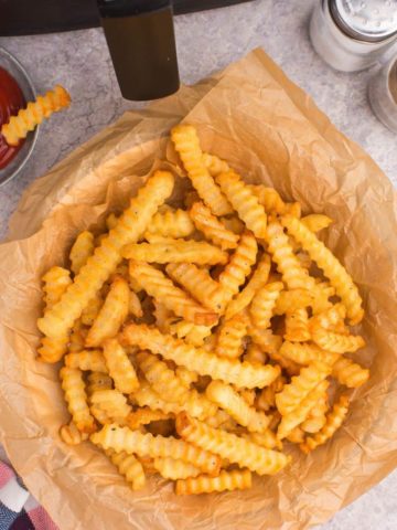 basket of air fryer crinkle cut french fries