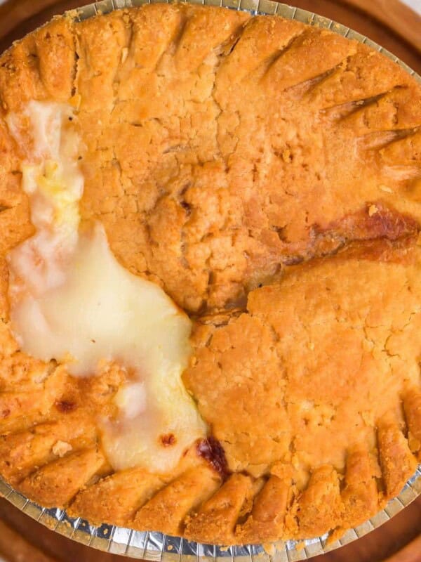 filling oozing out of a cooked pot pie