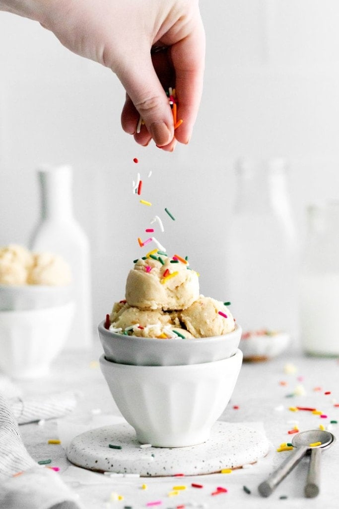 adding sprinkles to sugar cookie edible dough