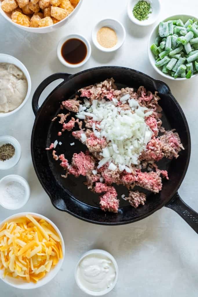 minced beef and onions in a pan