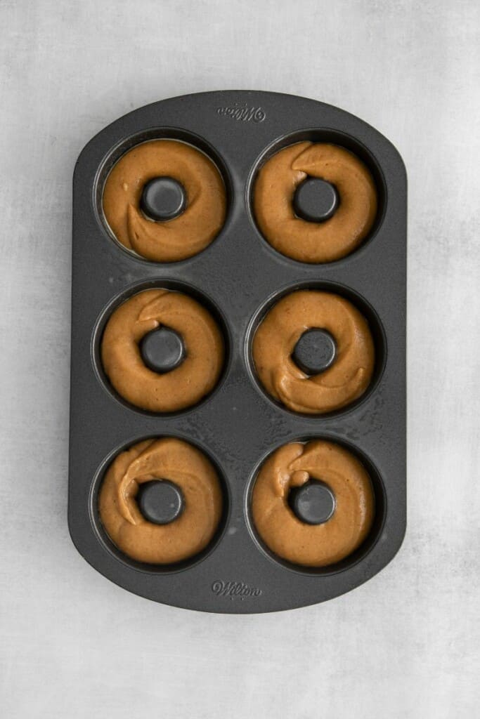 pumpkin donuts in pan