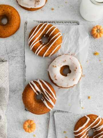 several pumpkin donuts